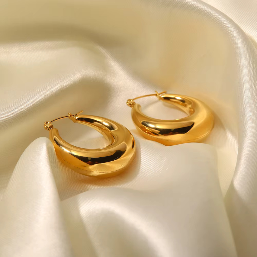 Gold curved hoop earrings