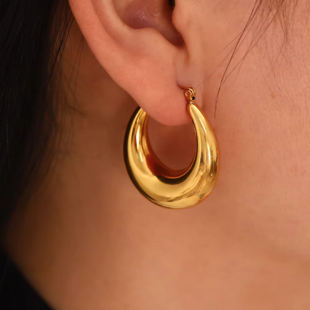 Gold curved hoop earrings